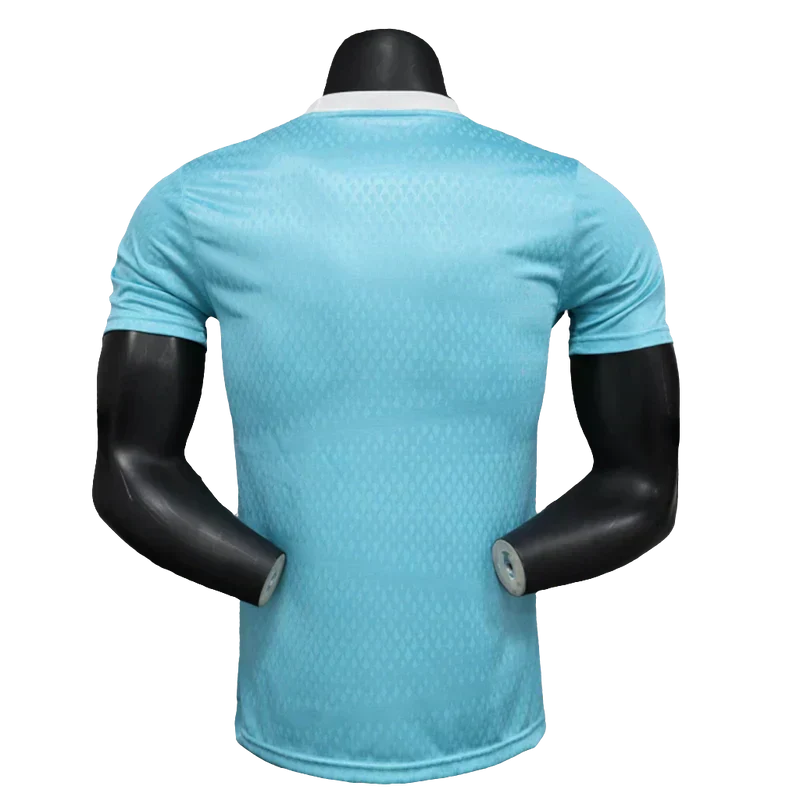 Camisa Arsenal 25/26 Pré-Jogo - Azul Celeste - Versão Jogador